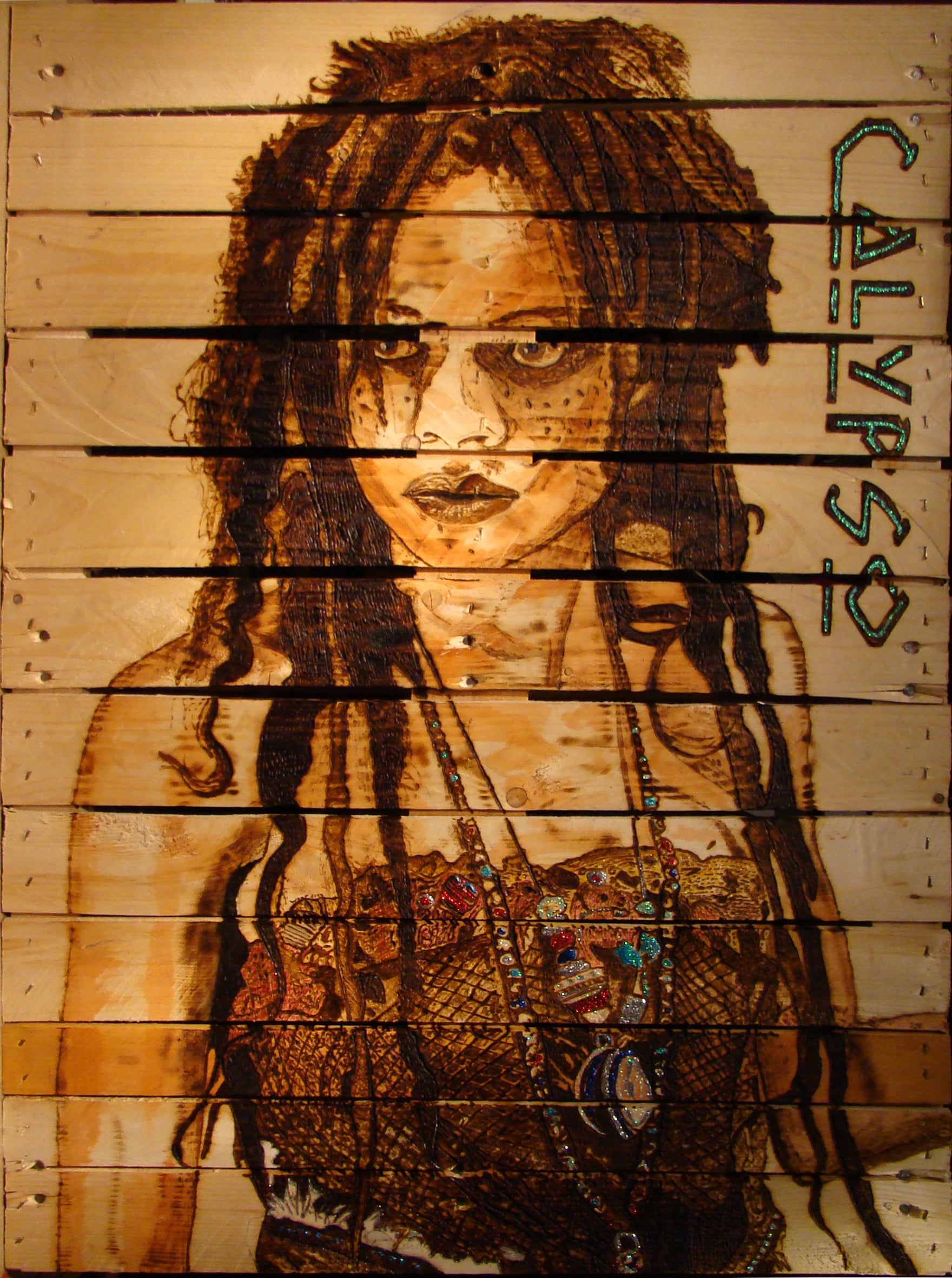 Calypso – figürliche Pyrographie auf Palette mit mythologischer Anmutung und sichtbaren Holzfugen; von Ralph D. Woop